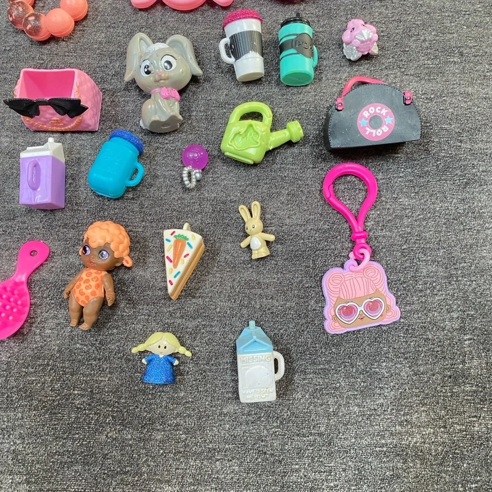 Six L.O.L Surprise dolls with 25 Piece  Accessories!